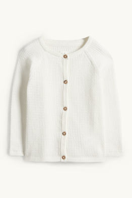 Kardigan niemowlęcy - wzór w warkocze