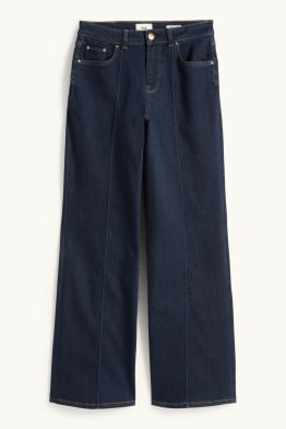 Jeans a gamba larga - vita media