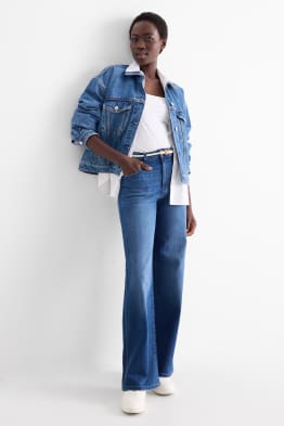 Jeans a gamba larga con cintura - vita media