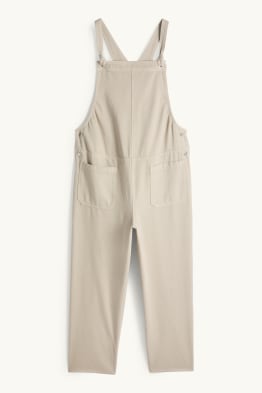 Těhotenské džínové kalhoty s laclem