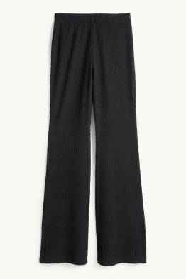 Flared leggings - finition texturée