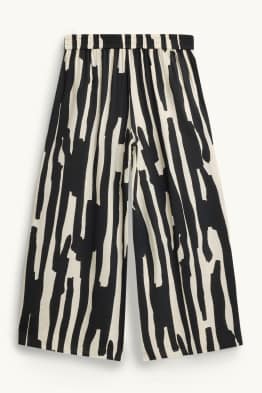 Pantalón de tela - high waist - wide leg - estampado