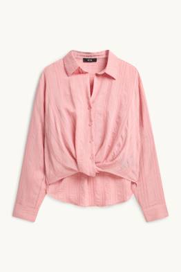 Blouse met knoop in de stof