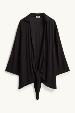 Blusa con detalle de nudo