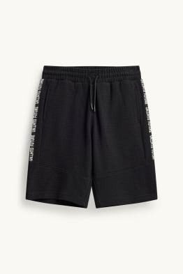 Pantalón corto deportivo - con textura