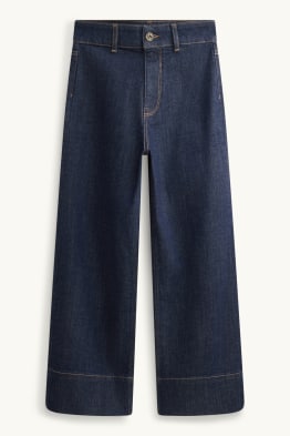Jeans a gamba larga - taglio corto - vita alta