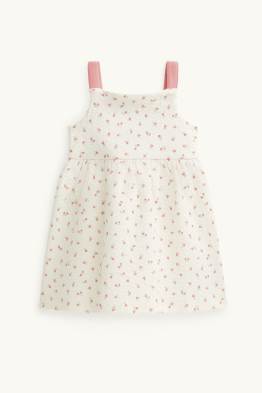 Petites fleurs - robe bébé - finition texturée