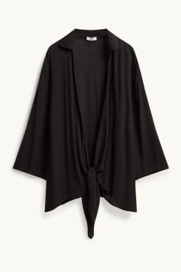 Blusa con detalle de nudo