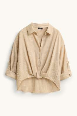 Blouse met knoop in de stof - gestreept