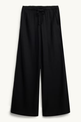 Pantalón de tela con parte de lino - mid waist - loose fit