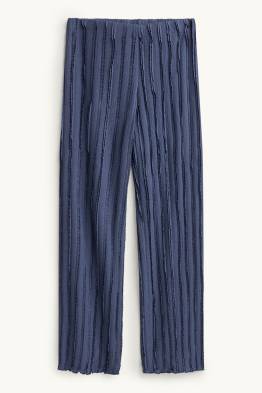 Pantalon en jersey - mid waist - wide leg - finition texturée