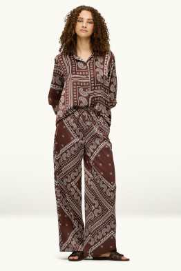 Pantalons de tela - mid waist - wide leg - amb motiu