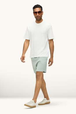 Pantalons curts de xandall - texturats
