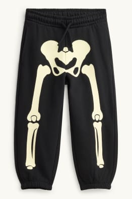 Halloween - esquelet - pantalons de xandall - brilla en la foscor