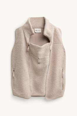 Zwangerschapsvest van fleece - met babydraagzak