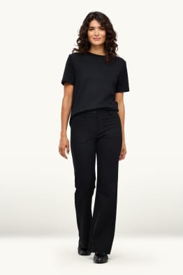 Flared Jeans - Mid Waist