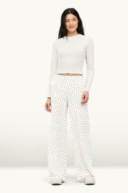Pantalon - mid waist - palazzo - met stippen