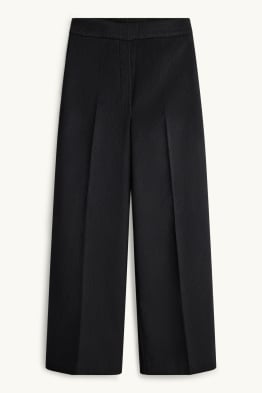 Pantaloni in velluto a coste - vita media - gamba ampia