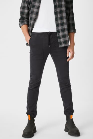 Hommes - Pantalon - jambes fuselées - noir