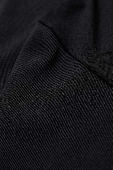 Femmes - Pantalon de grossesse en jersey - flared - noir
