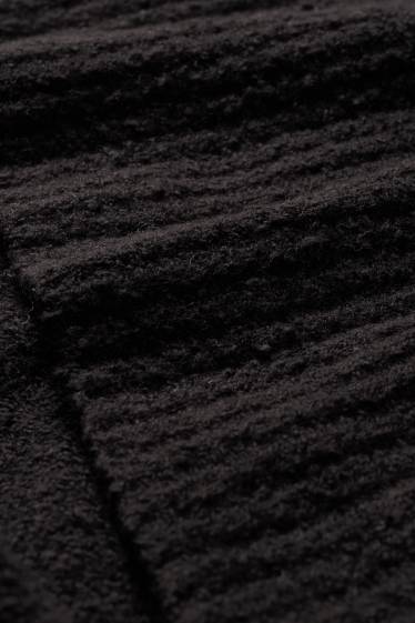 Femmes - Pull en maille bouclée à col roulé - noir