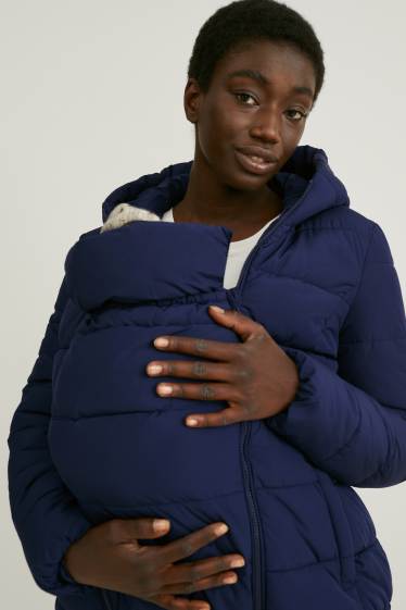 Dámské - Těhotenská prošívaná bunda s kapucí - nosící - tmavomodrá