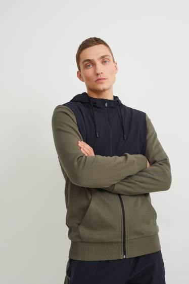 Hommes - Veste en molleton dotée d’une capuche - noir / beige