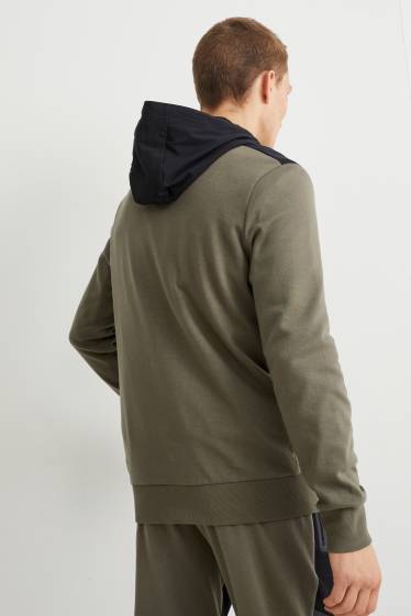 Hommes - Veste en molleton dotée d’une capuche - noir / beige