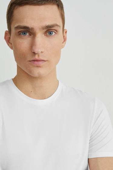 Uomo - T-shirt - Flex - bianco
