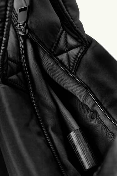 Damen - Großer Stepp-Shopper mit abnehmbarem Taschengurt - schwarz