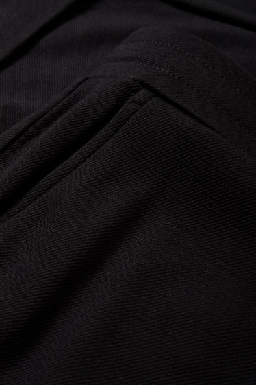 Women - Cloth trousers - mid-rise waist - tapered fit - black