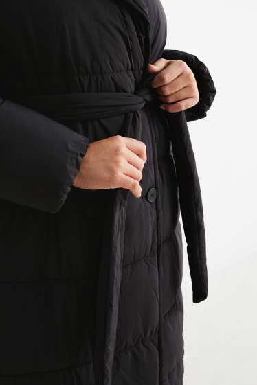Dona - Abric embuatat - negre
