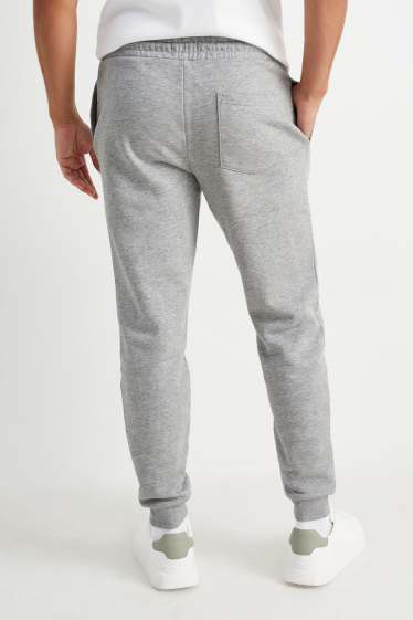 Home - Pantalons de xandall - gris clar jaspiat