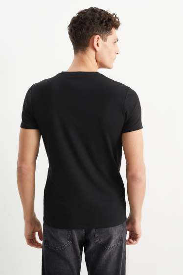 Uomo - T-shirt - Flex - nero