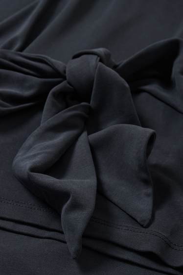 Women - Long sleeve top with knot detail - black