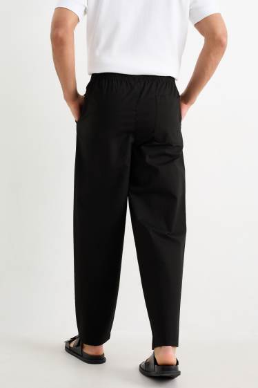Pánské - Kalhoty chino - tapered fit - černá