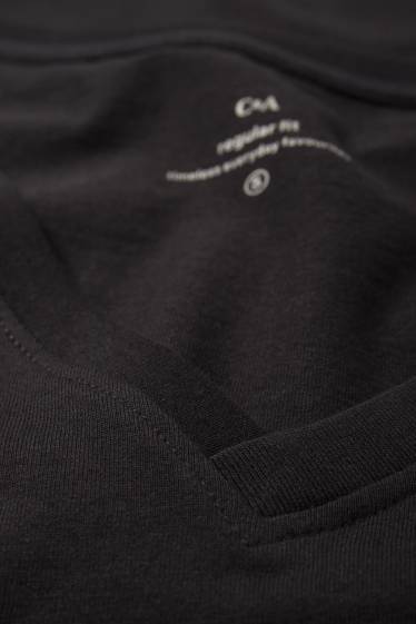 Dames - T-shirt met V-hals - regular fit - zwart