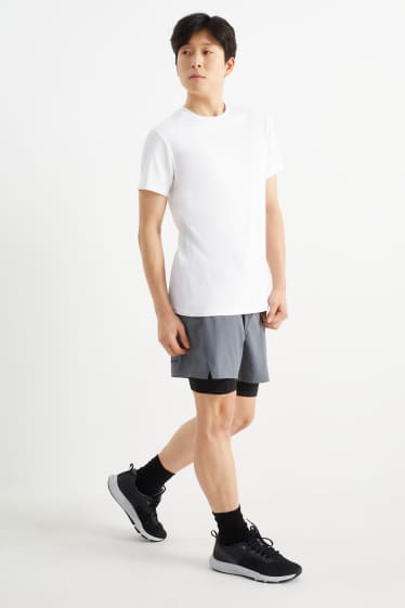 Uomo - Shorts tecnici - 4 Way Stretch - effetto sovrapposto - grigio
