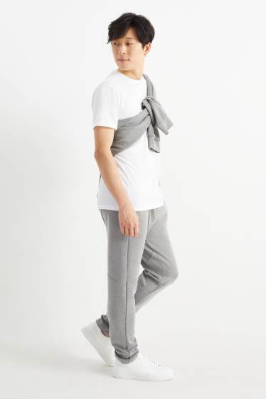 Home - Pantalons de xandall - gris clar jaspiat