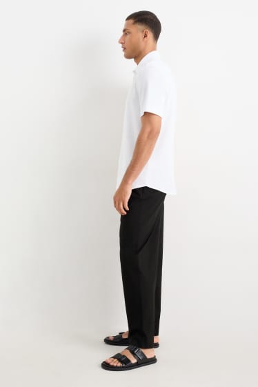 Pánské - Kalhoty chino - tapered fit - černá