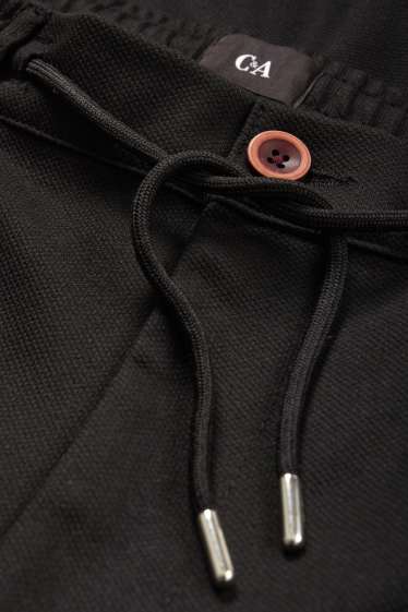 Hommes - Chino - tapered fit - noir