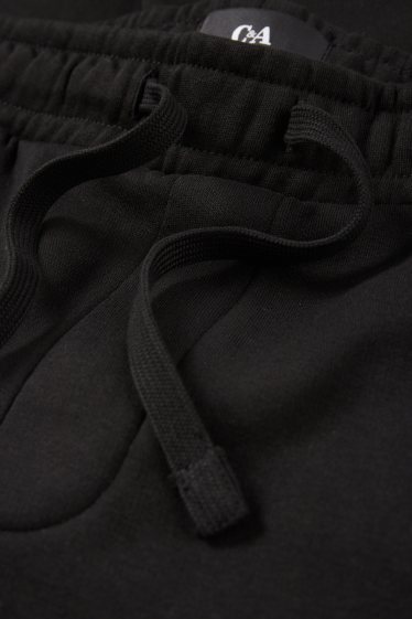 Bărbați - Pantaloni de trening - negru