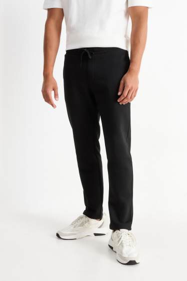 Bărbați - Pantaloni de trening - negru