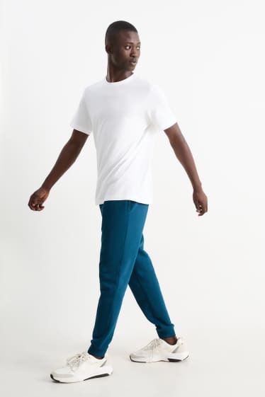 Hommes - Pantalon de jogging - bleu foncé