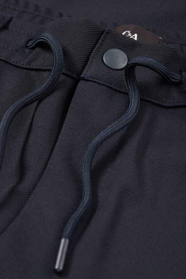 Home - Xinos - tapered fit - blau fosc