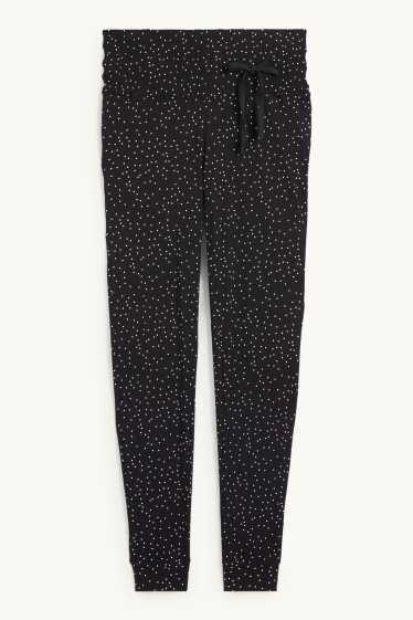 Damen - Umstands-Pyjamahose - gepunktet - schwarz