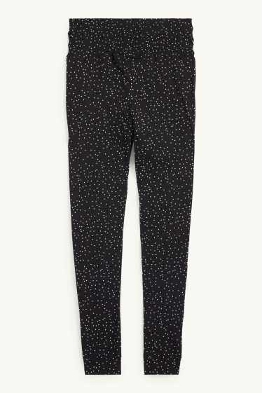 Damen - Umstands-Pyjamahose - gepunktet - schwarz