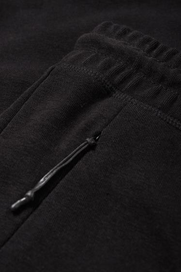 Bărbați - Pantaloni de trening - negru