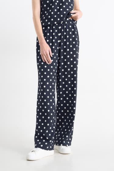 Women - Cloth trousers - high waist - wide leg - polka dot - dark blue