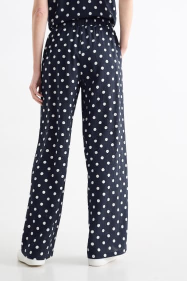 Women - Cloth trousers - high waist - wide leg - polka dot - dark blue